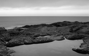 Preview wallpaper coast, water, sea, black and white, horizon