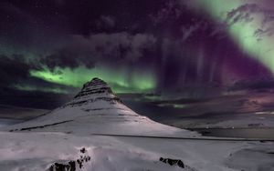 Preview wallpaper mountain, snow, northern lights, winter, night